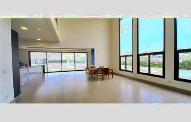 Imagem: A casa possui 3 Dormitórios, 3 Suítes, 8 Banheiros e 3 Vagas