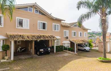 Imagem: A casa possui 3 Dormitórios, 1 Suíte, 3 Banheiros, 2 Vagas