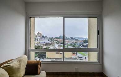 Imagem: O apartamento possui 2 Dormitórios, 1 Suíte, 3 Banheiros