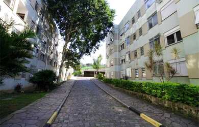 Imagem: O apartamento possui 3 Dormitórios, 1 Banheiro, 1 Vaga na garagem