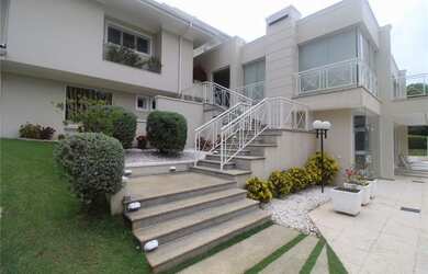 Imagem: A casa possui 8 Dormitórios, 11 Banheiros, 11 Vagas na garagem