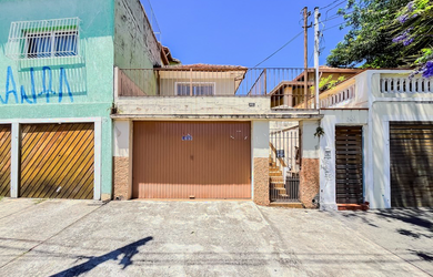 Imagem: A casa possui 3 Dormitórios, 2 Banheiros, 2 Vagas na garagem