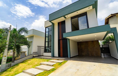 Imagem: A casa possui 3 Dormitórios, 3 Suítes, 8 Banheiros, 4 Vagas