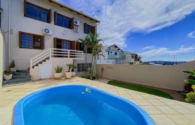 Imagem: A casa possui 4 Dormitórios, 3 Suítes, 5 Banheiros, 5 Vagas