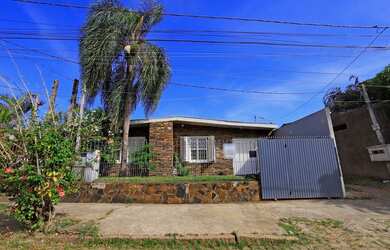 Imagem: A casa possui 3 Dormitórios, 2 Banheiros, 54m² de Área e