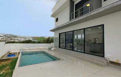 Imagem: A casa possui 4 Dormitórios, 3 Suítes, 4 Banheiros, 3 Vagas