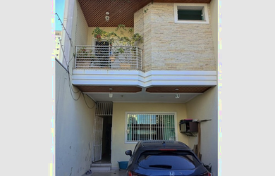 Imagem: A casa possui 3 Dormitórios, 3 Suítes, 5 Banheiros, 3 Vagas