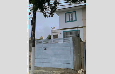 Imagem: A casa possui 2 Dormitórios, 3 Banheiros, 2 Vagas na garagem