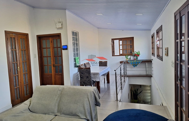 Imagem: A casa possui 2 Dormitórios, 2 Banheiros, 2 Vagas na garagem