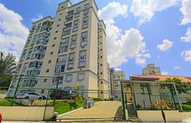 Imagem: O apartamento possui 3 Dormitórios, 1 Banheiro e 1 Vaga na