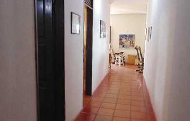 Imagem: A casa possui 3 Dormitórios, 2 Suítes, 2 Banheiros, 4 Vagas