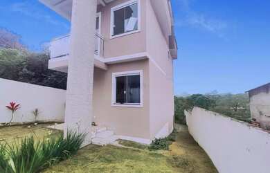 Imagem: A casa possui 2 Dormitórios, 2 Suítes, 1 Banheiro, 1 Vaga