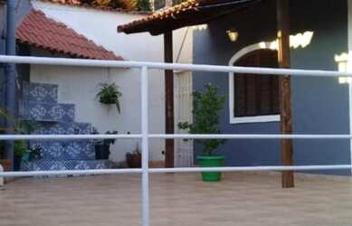 Imagem: A casa possui 3 Dormitórios, 1 Suíte, 1 Banheiro, 2 Vagas