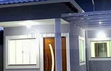 Imagem: A casa possui 2 Dormitórios, 1 Suíte, 1 Banheiro, 3 Vagas