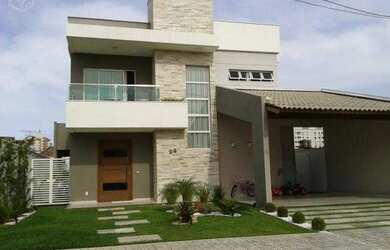 Imagem: A casa possui 3 Dormitórios, 3 Suítes, 1 Banheiro, 4 Vagas