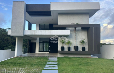 Imagem: A casa possui 4 Dormitórios, 4 Suítes, 5 Banheiros, 4 Vagas