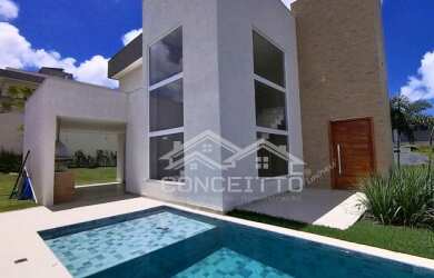 Imagem: A casa possui 4 Dormitórios, 4 Suítes, 5 Banheiros, 4 Vagas