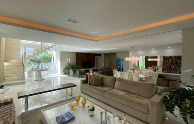 Imagem: A casa possui 4 Dormitórios, 4 Suítes, 6 Banheiros, 3 Vagas