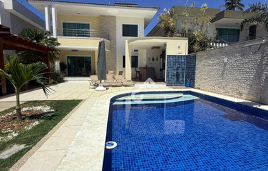 Imagem: A casa em condomínio possui 4 Dormitórios, 3 Suítes, 2 Vagas