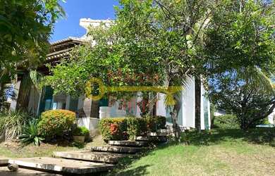 Imagem: A casa possui 3 Dormitórios, 3 Suítes, 5 Banheiros e 860m²