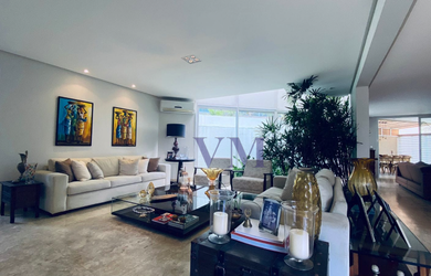 Imagem: A casa possui 5 Dormitórios, 5 Suítes, 6 Banheiros, 3 Vagas