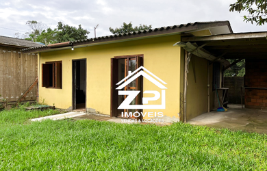 Imagem: A casa possui 2 Dormitórios, 1 Banheiro, 1 Vaga na garagem