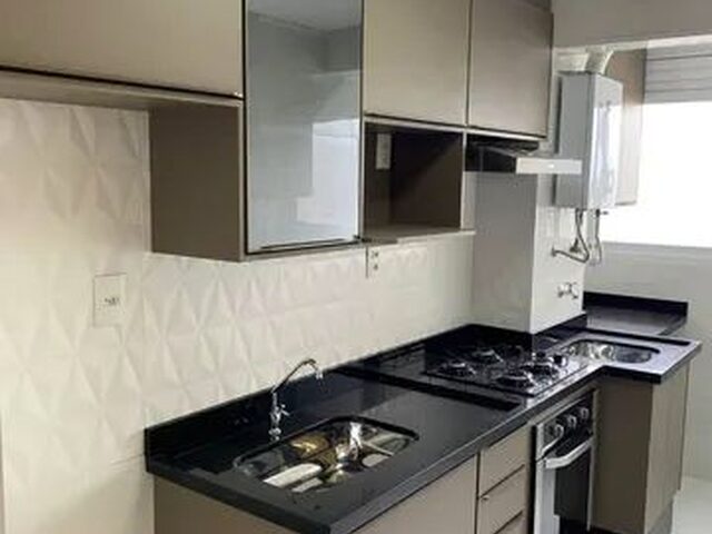 Imagem: O apartamento possui 2 Dormitórios, 1 Banheiro, 1 Vaga na